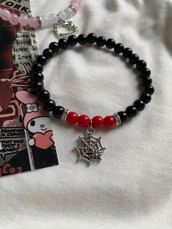 Spiderman and Hello Kitty matching bracelets